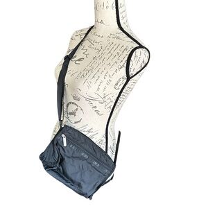 LeSportsac Black Nylon Cross Body with Gray Zipped cosmetic bag